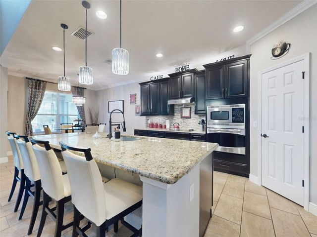 9223 IVYWOOD STREET, Clermont, FL 34711