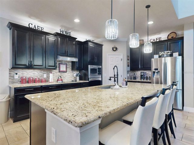 9223 IVYWOOD STREET, Clermont, FL 34711