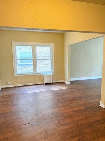 7047 S EBERHART Avenue, Chicago, IL 60637