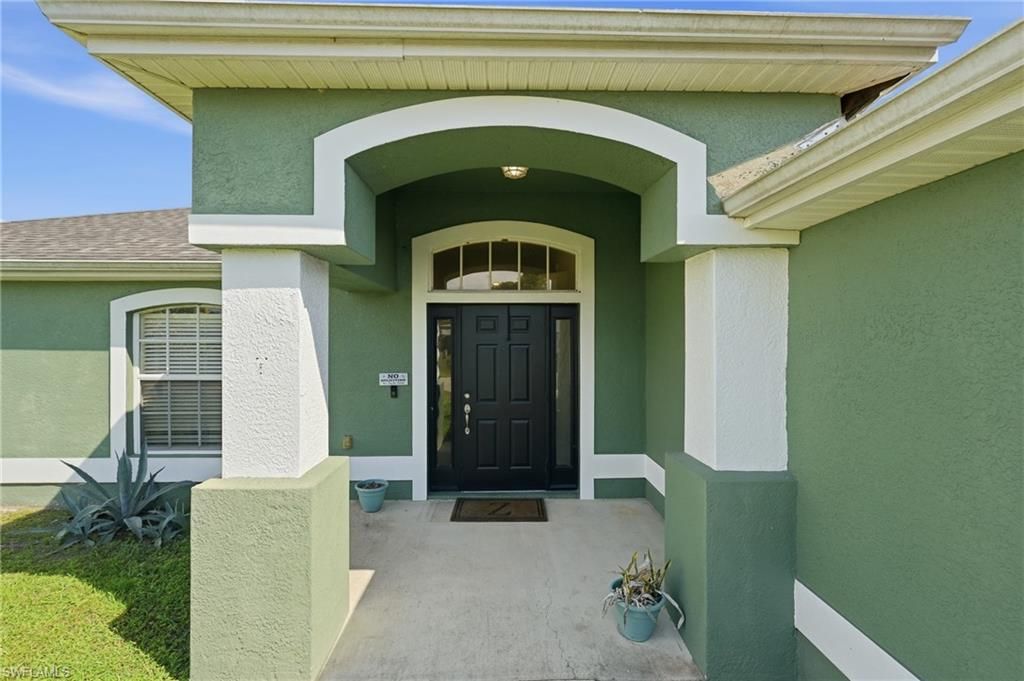 212 NW 28th TER, CAPE CORAL, FL 33993 — exterior