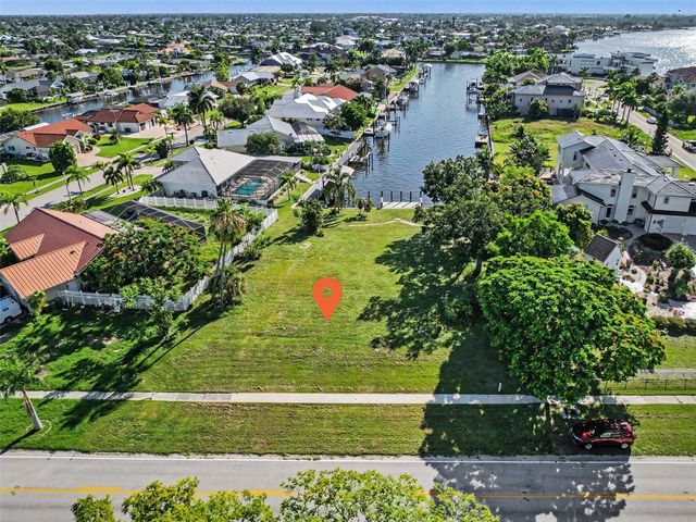 180 COUSLEY DRIVE SE, Port Charlotte, FL 33952
