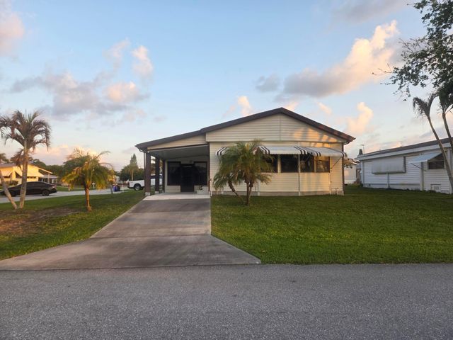 7107 SE Seahawk Street, Hobe Sound, FL 33455