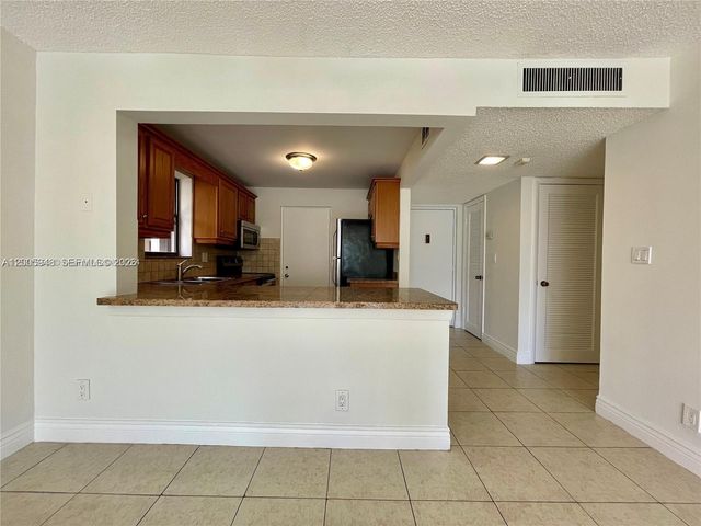 2320 S Cypress Bend Drive 204, Pompano Beach, FL 33069