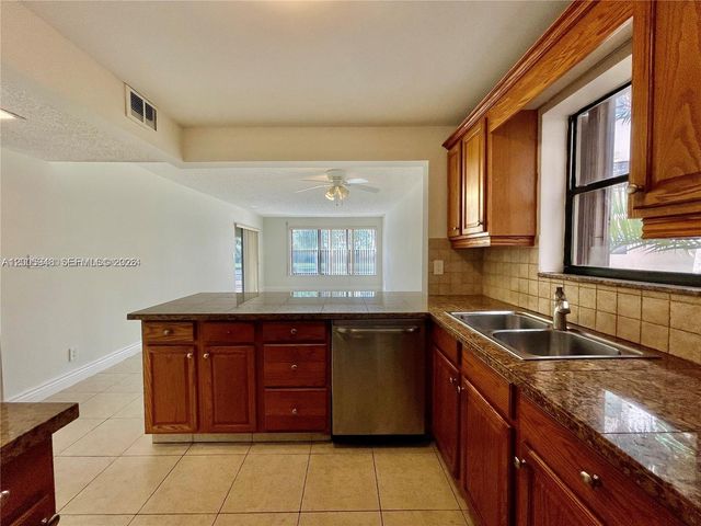 2320 S Cypress Bend Drive 204, Pompano Beach, FL 33069