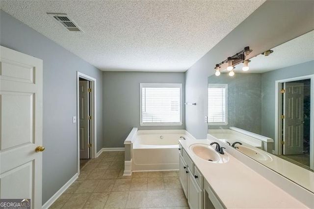 1050 DUNEDIN Trail, Woodstock, GA 30188