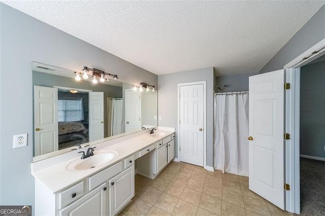 1050 DUNEDIN Trail, Woodstock, GA 30188