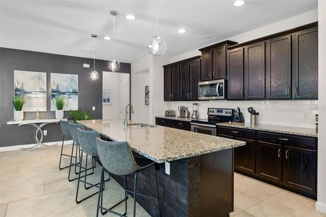 9051 SUNSHINE RIDGE LOOP, Kissimmee, FL 34747