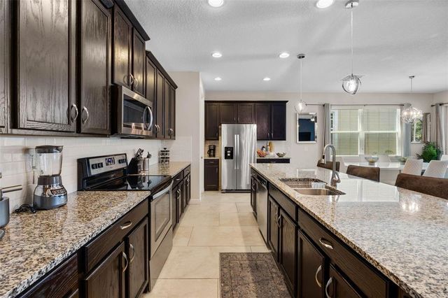 9051 SUNSHINE RIDGE LOOP, Kissimmee, FL 34747