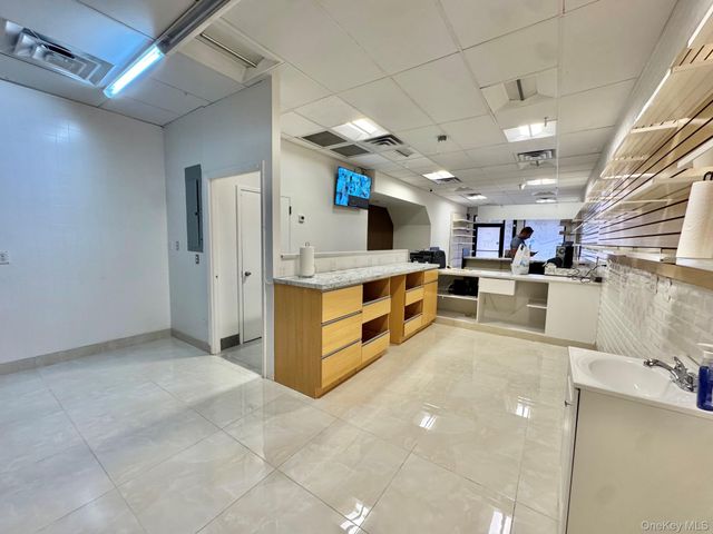 75-11 75-13 METROPOLITAN Avenue, Middle Village, NY 11378