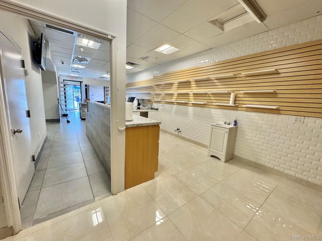 75-11 75-13 METROPOLITAN Avenue, Middle Village, NY 11378
