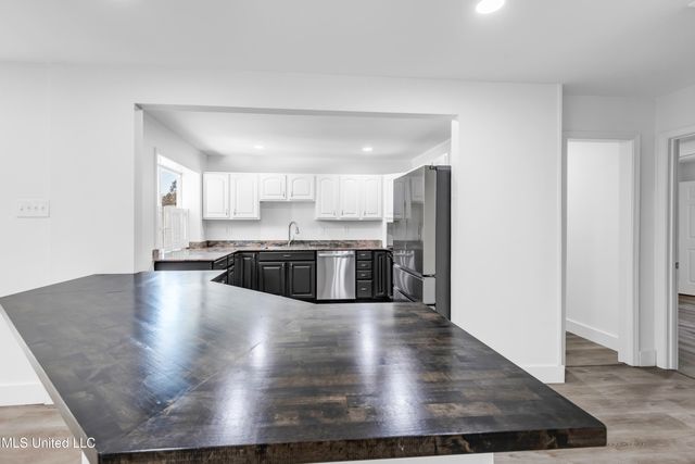 8828 Manoo Place, Diamondhead, MS 39525