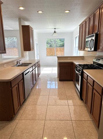 11347 Sandstone Canyon Drive, Humble, TX 77396