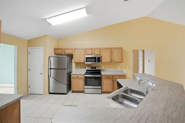 1692 SW Lofgren Avenue, Port St. Lucie, FL 34953