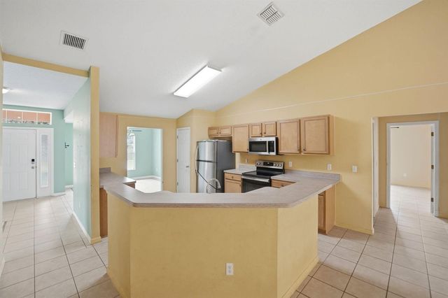 1692 SW Lofgren Avenue, Port St. Lucie, FL 34953