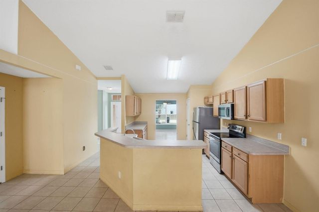1692 SW Lofgren Avenue, Port St. Lucie, FL 34953