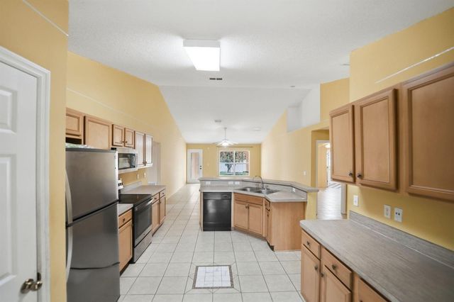 1692 SW Lofgren Avenue, Port St. Lucie, FL 34953