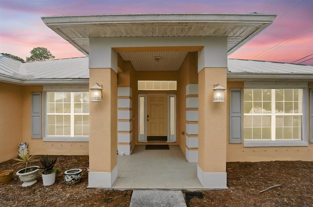 1692 SW Lofgren Avenue, Port St. Lucie, FL 34953