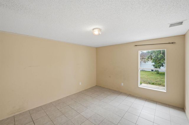 1692 SW Lofgren Avenue, Port St. Lucie, FL 34953