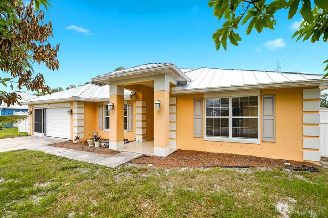 1692 SW Lofgren Avenue, Port St. Lucie, FL 34953
