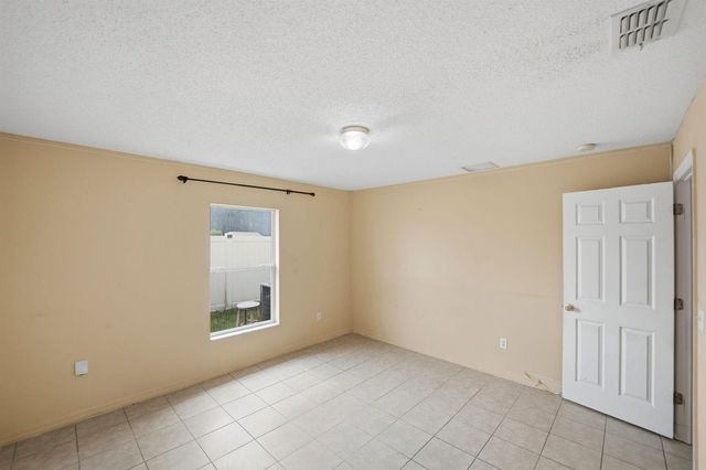1692 SW Lofgren Avenue, Port St. Lucie, FL 34953