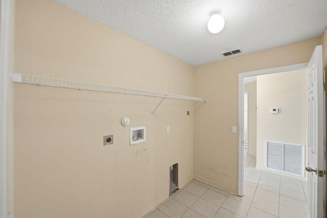 1692 SW Lofgren Avenue, Port St. Lucie, FL 34953