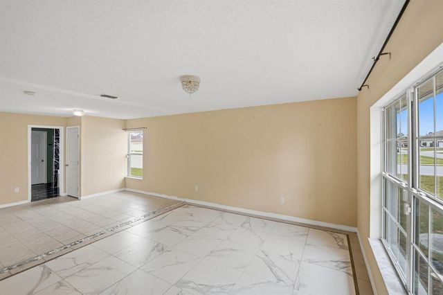 1692 SW Lofgren Avenue, Port St. Lucie, FL 34953
