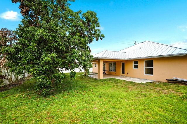 1692 SW Lofgren Avenue, Port St. Lucie, FL 34953