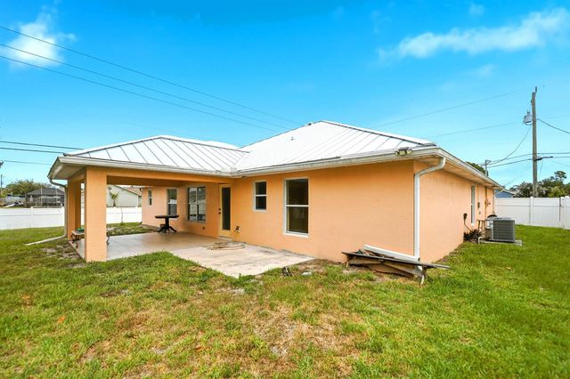 1692 SW Lofgren Avenue, Port St. Lucie, FL 34953