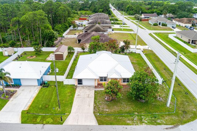 1692 SW Lofgren Avenue, Port St. Lucie, FL 34953