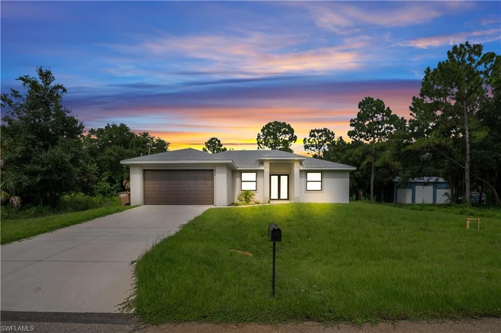 516 Dayton AVE, LEHIGH ACRES, FL 33972 — exterior
