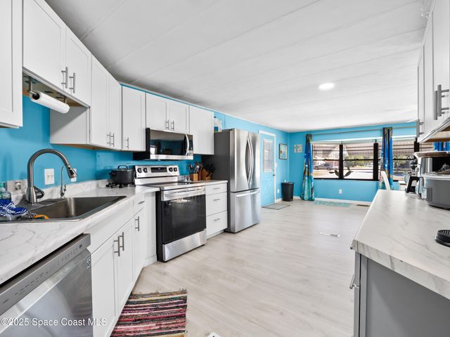 1040 Waterway Drive, Barefoot Bay, FL 32976