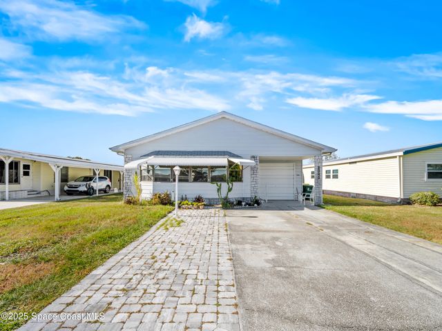 1040 Waterway Drive, Barefoot Bay, FL 32976