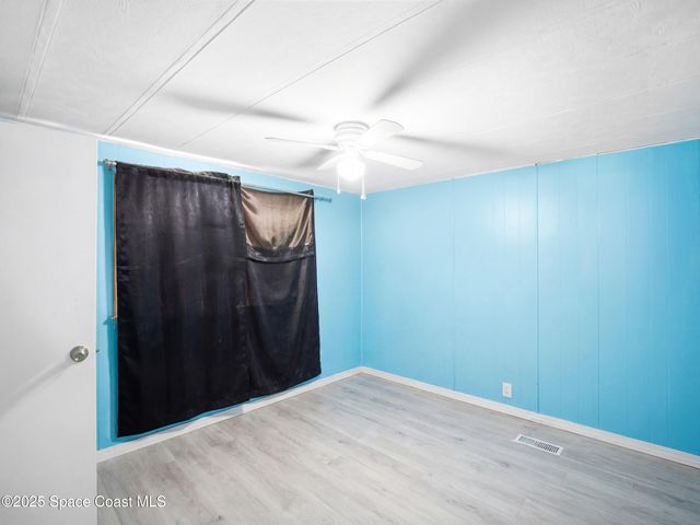 1040 Waterway Drive, Barefoot Bay, FL 32976