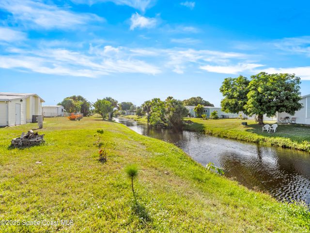 1040 Waterway Drive, Barefoot Bay, FL 32976