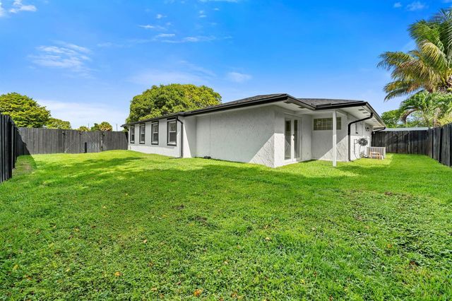 908 Hibiscus Drive, Royal Palm Beach, FL 33411