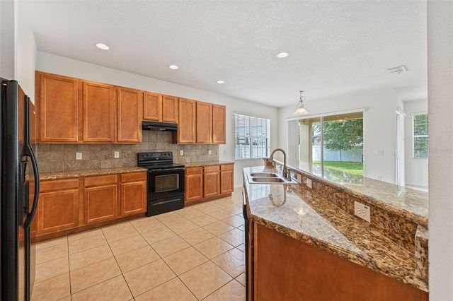 10075 BAYWATER BREEZE DRIVE, Orlando, FL 32827