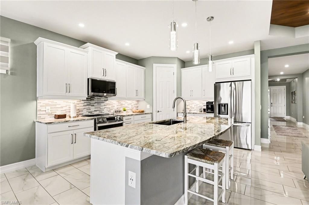 Image 2 of property listing at 355 Spring Hill Lake LOOP, Cape Coral, FL 33993