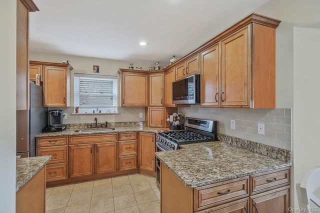 61 Arpage Drive E, Shirley, NY 11967