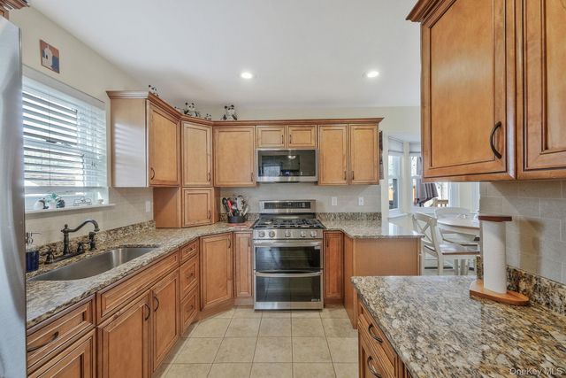 61 Arpage Drive E, Shirley, NY 11967