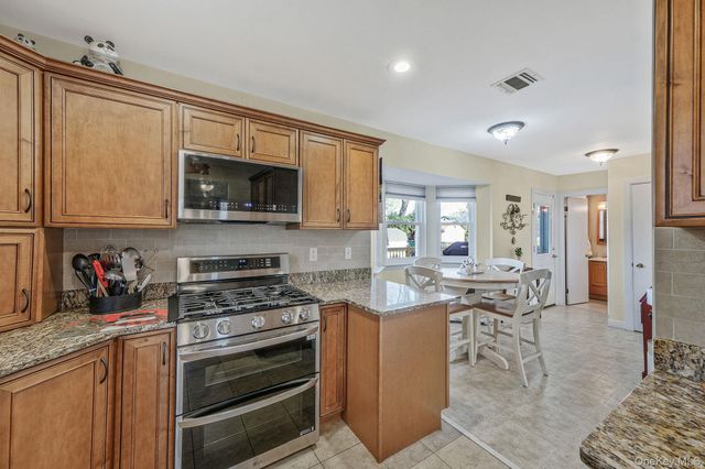 61 Arpage Drive E, Shirley, NY 11967