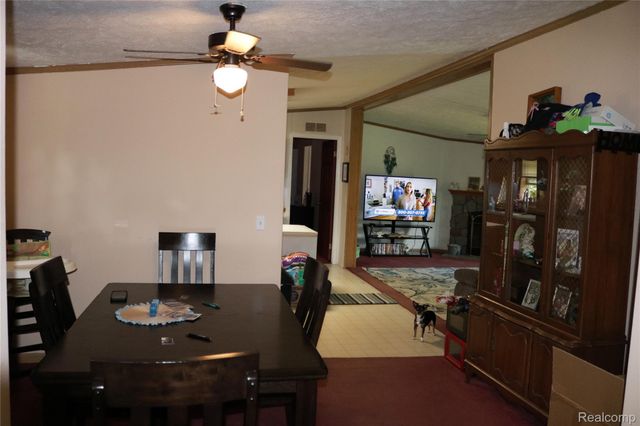 311 Peach Blossom Ct, Otisville Village, MI 48463