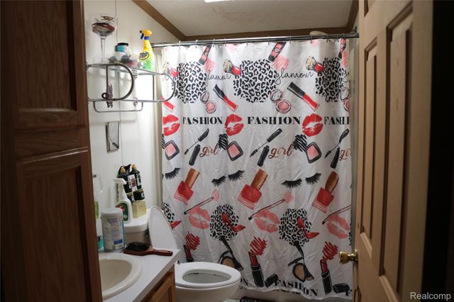 311 Peach Blossom Ct, Otisville Village, MI 48463