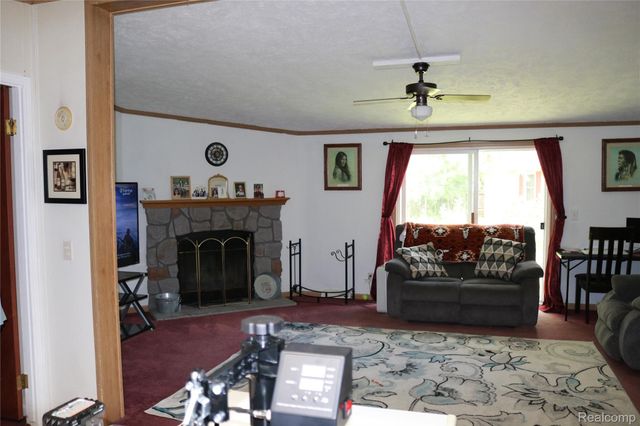 311 Peach Blossom Ct, Otisville Village, MI 48463