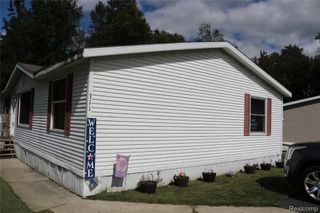311 Peach Blossom Ct, Otisville Village, MI 48463