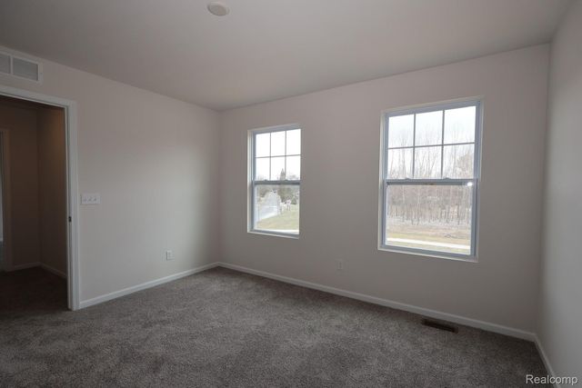 360 Hidden River W, Holly Township, MI 48442