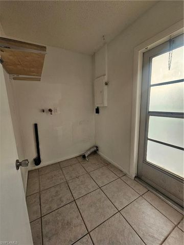 423 Morgan CIR S, Lehigh Acres, FL 33936