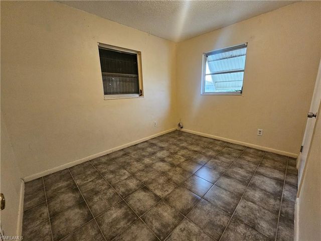 423 Morgan CIR S, Lehigh Acres, FL 33936
