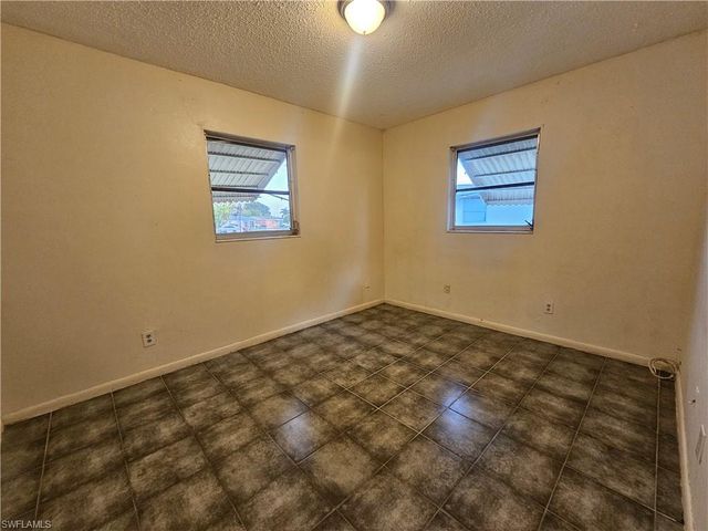 423 Morgan CIR S, Lehigh Acres, FL 33936
