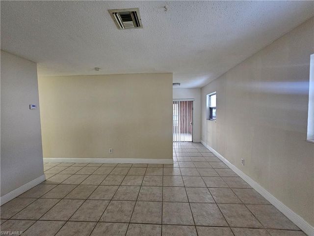 423 Morgan CIR S, Lehigh Acres, FL 33936