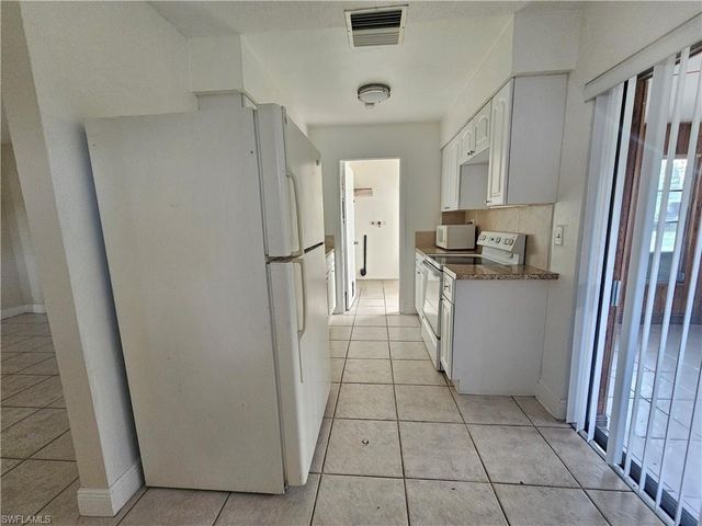 423 Morgan CIR S, Lehigh Acres, FL 33936